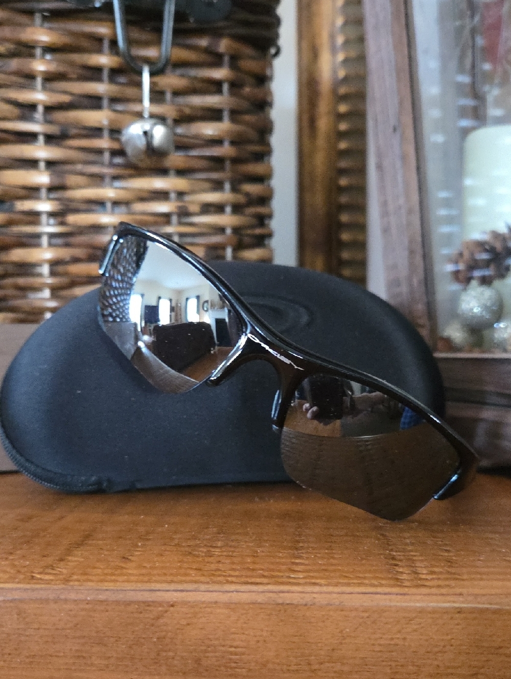 Oakley Black Wrap Sunglasses with Mirrored Lenses
